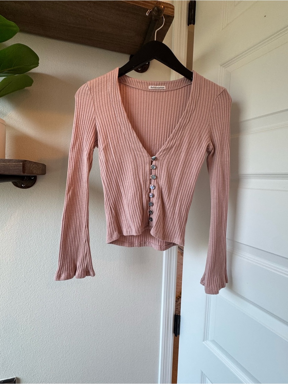 Reformation Blush Pink Ribbed V‑Neck bell sleeved top